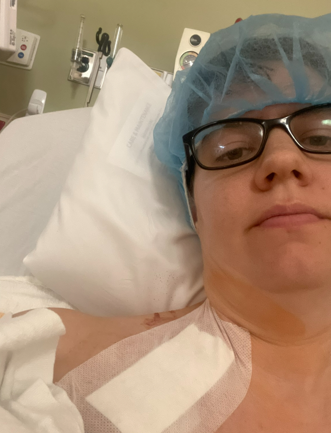 woman in hospital after chest port placement surgery